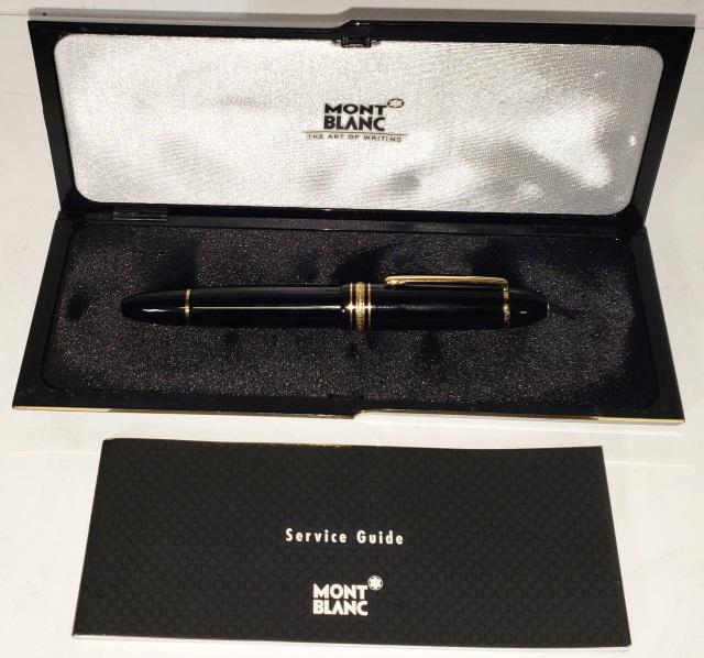 MONT BLANC MONTBLANC FOUNTAIN PEN: Black, center band signed "Mont Blanc Meisterstuck no. 149", 18K gold nib marked "4810 18K Mont Blanc 750", with box.