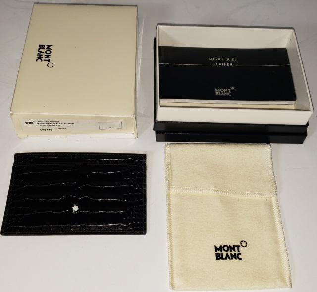 MONT BLANC MONTBLANC LEATHER BUSINESS CARD HOLDER: Black, outside full grain calf skin, inside full grain goat skin, with original box, cloth pouch, and leather service guide.
