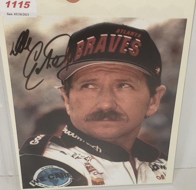 DALE EARNHARDT AUTOGRAPHED PHOTO: Dale Earnhardt color photo, autographed with black sharpie, Steve Fine Sports certificate of authenticity.