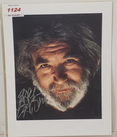 JERRY GARCIA AUTOGRAPHED PHOTO: Jerry Garcia color photo, autographed with silver sharpie, Steve Fine Sports and Celebrity Memorabilia certificate of authenticity.