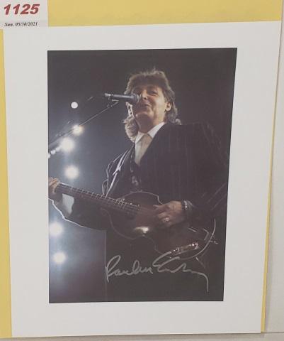 PAUL MCCARTNEY AUTOGRAPHED PHOTO: Paul McCartney color photo, autographed with silver sharpie, Steve Fine Sports and Celebrity Memorabilia certificate of authenticity.