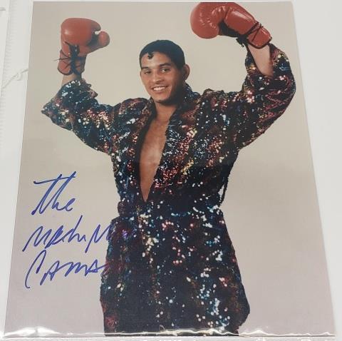 HECTOR CAMACHO AUTOGRAPHED PHOTO: Hector Camacho autographed color photo, signed "The Mach Man Camacho", with blue sharpie, Certificate of Authenticity Main Street Sportscards & Memorabilia.
