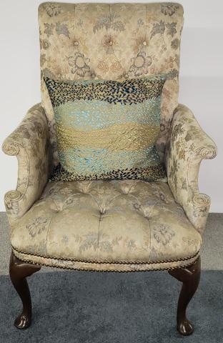 QUEEN ANNE STYLE ARMCHAIR: Having floral upholstery, raised on padded feet, approximate height 40", width 28 1/2", depth 28".