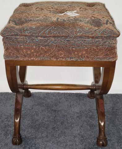 WALNUT BENCH: Having hoof form feet, approximate height 20", diameter 15 1/2".