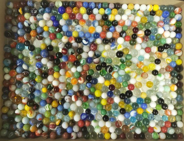 GROUP OF MISCELLANEOUS MARBLES: Glass marbles in 2 containers.