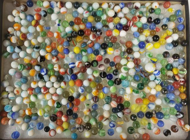 GROUP OF MISCELLANEOUS MARBLES: Glass marbles in 2 containers.