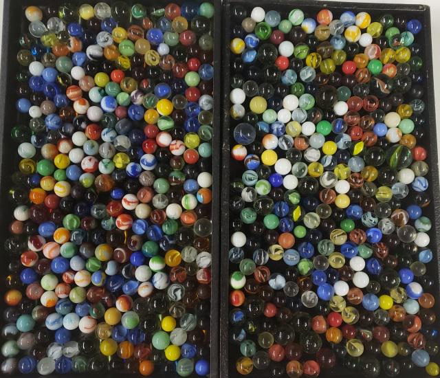 GROUP OF MISCELLANEOUS MARBLES: Glass marbles in 2 containers.