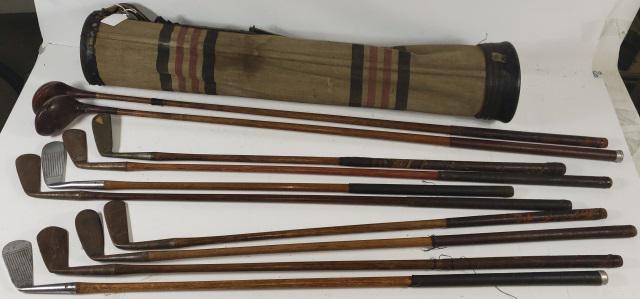 9 VINTAGE WOODEN SHAFT GOLF CLUBS: Irons, putter, woods, together with bag, RH
