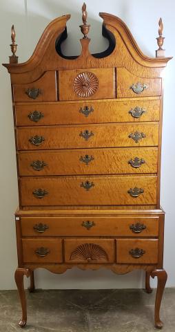 CENTENNIAL QUEEN ANNE STYLE HIGHBOY: Upper section having broken swan neck pediment and fitted with 3 small drawers over 4 graduated drawers, top of base fitted with 3 drawers and flanked by single shell design drawer.