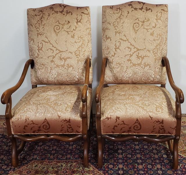 PAIR OF BARONIAL STYLE ARMCHAIRS: Having curved arm rests, paisley peach upholstered back and seat., approximate height 45 1/2", width 32", depth 32".