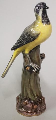 MEISSEN PORCELAIN FIGURE: Bird on tree trunk, approximate height 8 3/4".