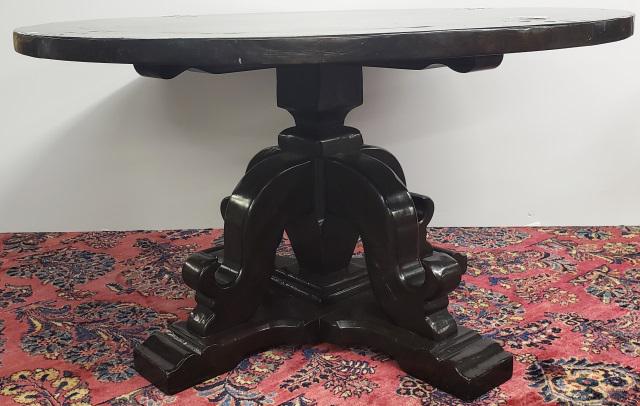PERIOD STYLE DINING TABLE: Having circular top, with ebony finish, raised on pedestal base, approximate height 30", diameter 54".