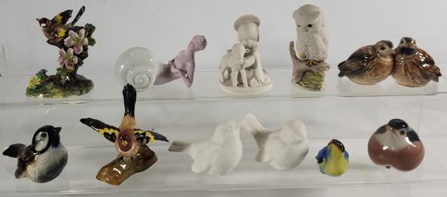 GROUP OF PORCELAIN FIGURES: Including birds by Crown Staffordshire, Royal Copenhagen, Goebel, owl by Cybis, Royal Bayreuth figure of nude in shell, etc.