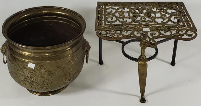 2 PIECES OF BRASS: Brass trivet, approximate height 11 1/8", width 13", depth 11 3/8", along with a brass planter with lion mask handles, and decorated with scroll work, approximate height 10 1/4".