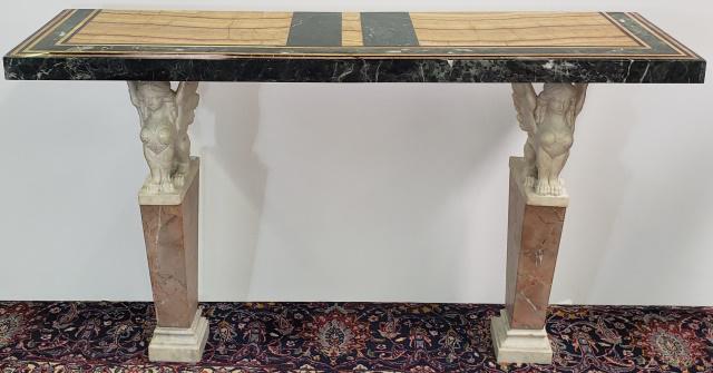 ANTIQUE MARBLE & CONCRETE CONSOLE: Having concrete top with Art Deco marble overlay, raised on 2 marble bases with carved Sphinx, approximate height 39", width 63 1/4", depth 18". beautiful and very heavy.