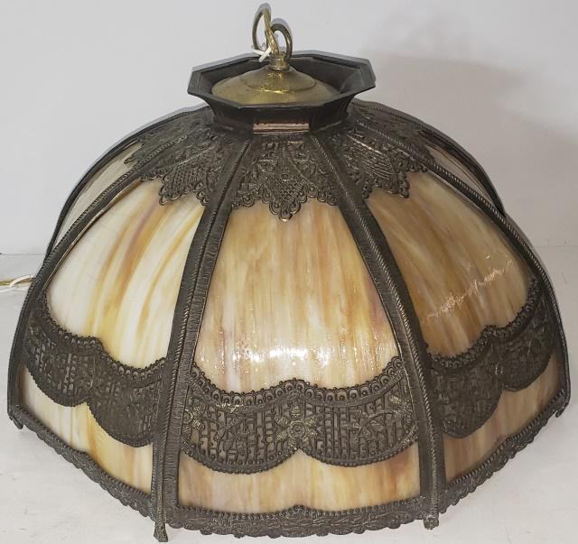 SLAG GLASS HANGING LIGHT: Having 8 caramel glass panels, in metal frame with floral & leaf design,approximate diameter, 15".