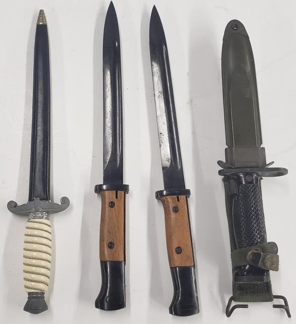 4 EDGED WEAPONS: Comprising German dagger with scabbard and 3 bayonets.