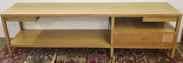 MID CENTURY MODERN SOFA TABLE: Having 2 drawers over 2 shelves, no visible signature, approximate height 26 1/4", width 86", depth 18".