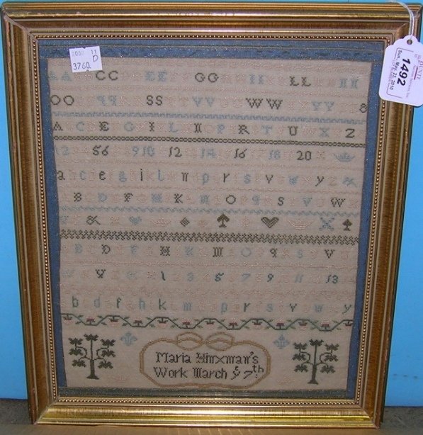 ***19TH CENTURY AMERICAN SAMPLER: By Maria Hinxman, containing letters and numbers, highlighted with tree remarks, approximately 11 1/2'' x 9 1/4'', with frame 13'' x 11''.