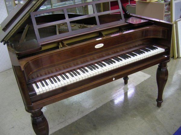 ***STEINWAY AND SONS BABY GRAND PIANO: Model M, serial number 249981, enclosed in mahogany case, approximate height 39'', width 56'', depth 66'', complete with bench.