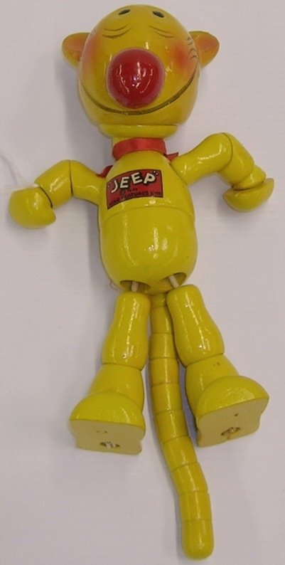 ***SEGAR, ELZIE CRISLER| 7" jonted Jeep figure: ***SEGAR, ELZIE CRISLER| (1894-1938 American), 7" jointed Jeep figure (one of the Popeye characters), having decal on chest reading "JEEP" copyright 1935 KING FEATURES SYN.", item comes from the Elzie