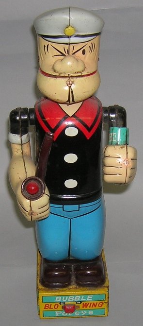 LINEMAR TIN "BUBBLE BLOWING POPEYE"|: LINEMAR TIN "BUBBLE BLOWING POPEYE"| Battery opperated tin toy by Linemar toys, head and arms do move, pipe lights up, approximate height 11 7/8".