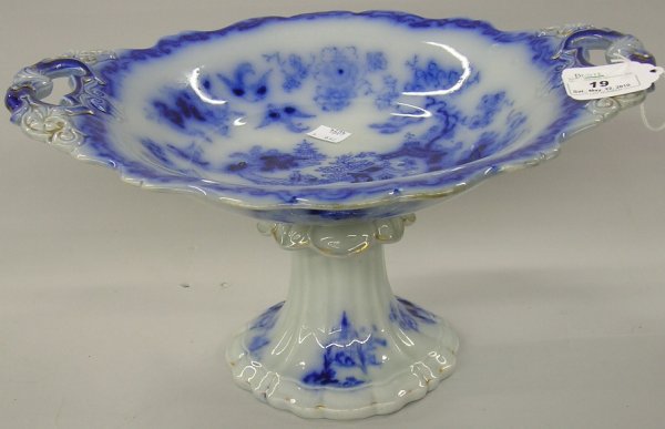 ***FLOW BLUE 2-HANDLED COMPOTE: Marked on underside ''Ironstone China'', approximate height 7 1/2''.