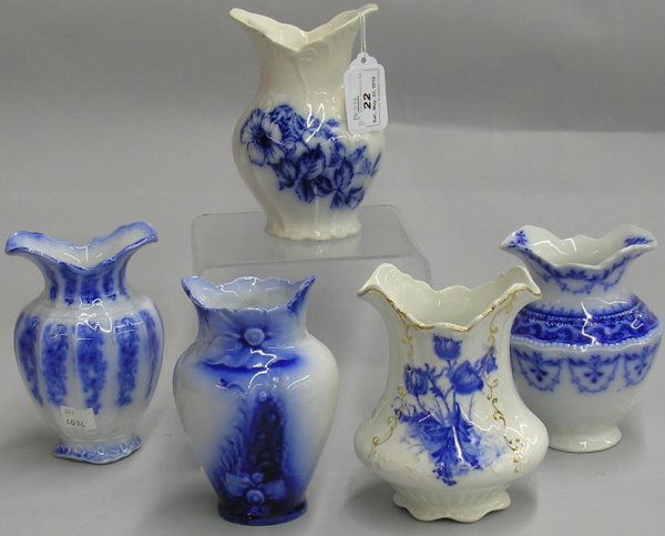 ***FIVE FLOW BLUE TOOTHPICK HOLDERS: W.H. Grindley ''Festoon'' pattern, W.H. Grindley ''Athens'' pattern, La Belle, Wedgwood ''Hilda'' pattern and S.H. & S. ''Essex'' pattern, approximate height 5 1/4''-5 3/4''.