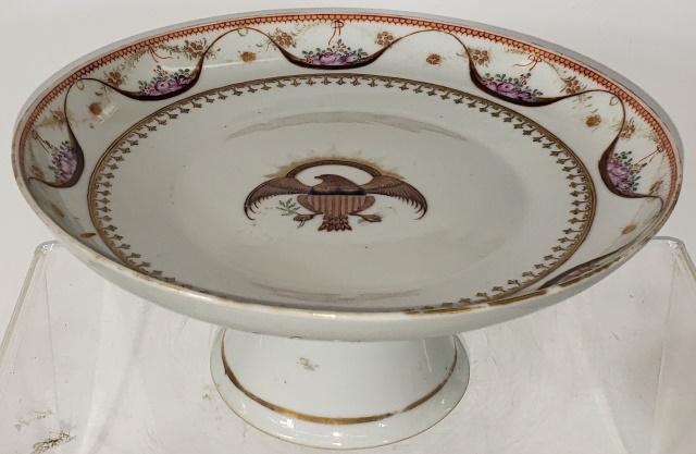 19TH CENTURY PORCELAIN COMPOTE: Decorated with American bald eagle, swirling ribbon and flora, approximate height 4 1/4", diameter 9 1/2".