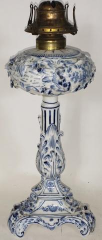 MEISSEN OIL LAMP: Decorated with flora, approximate height 14 1/8".