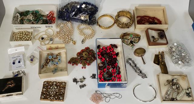 GROUP OF MISCELLANEOUS COSTUME JEWELRY: Including bracelets, necklaces, charms, rings, compact, etc.