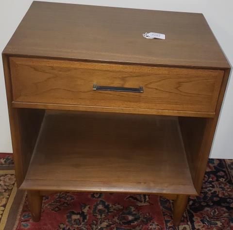RAMSEUR MID-CENTURY NIGHTSTAND: Having single drawer with opening below, approximate height 25 1/2", width 22", depth 16 5/8 with handle.