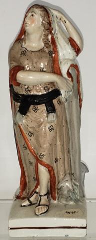 PEARLWARE FIGURE: Depicting woman leaning on anchor, approximate height 6 13/16".