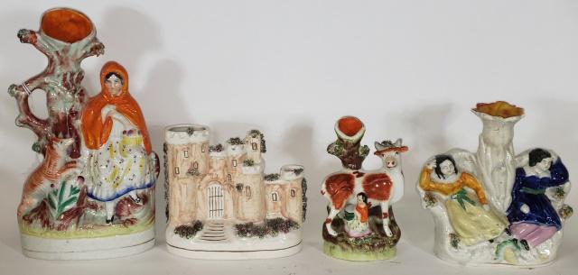 4 STAFFORDSHIRE FIGURAL VASES: Comprising "Little Red Riding Hood", approximate height 10 1/8", 2 women on sofa, 6 1/4", house, 5 3/8" and woman milking cow, 5 11/16".