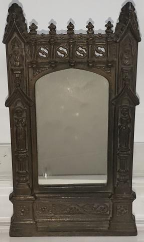 OSCAR BACH STUDIOS MIRROR: Small wall mirror, marked Oscar B. Bach Studios, Inc., approximate height 9 11/16", width 5 1/2".