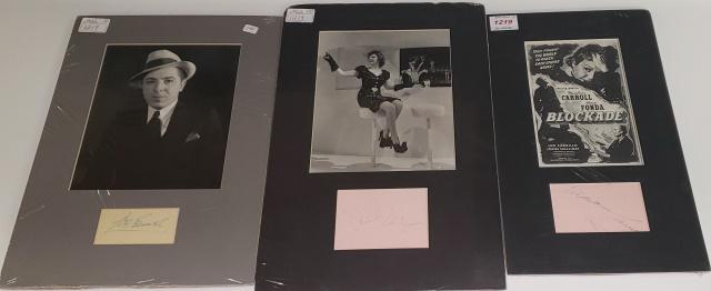 3 SIGNED PIECES: Madeline Carroll signed cut with a mini poster print, Martha Raye signed cut with a 7" x 9" photo of her sitting on a stool, and a Joe Penner signed cut with matted photo, approximately 7" x 9".