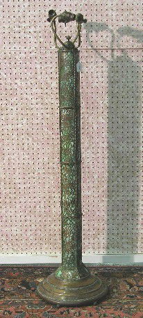 RIVIERE STUDIOS FLOOR LAMP BASE| Having green to: RIVIERE STUDIOS FLOOR LAMP BASE| Having green to white slag glass panels, with leaf form patinated metal overlay and fitted with four arm light cluster, signed on base Riviere Studios, height 53''. CO