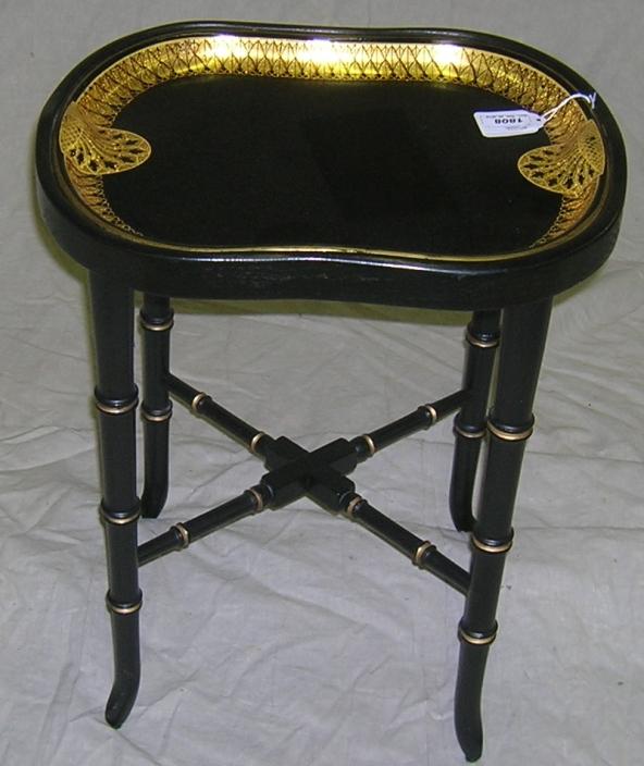 ***REGENCY STYLE PAPIER MACHE TRAY TOP TABLE: Having gilt and ebony inset tray raised on bamboo style base, approximate height 19", width 15 1/4", depth 11 3/4".