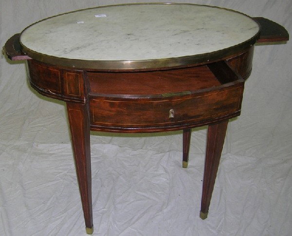 ***19TH CENTURY FRENCH SIDE TABLE: Having inset oval marble top with brass banding over single drawer and 2 pull out candle stands and raised on square tapering legs, approximate height 28 3/4", width 31", depth 21".