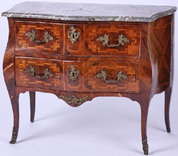 ***MID 18TH CENTURY LOUIS XV ROSEWOOD AND PARQUET: ***MID 18TH CENTURY LOUIS XV ROSEWOOD AND PARQUETRY COMMODE| Having shaped marble top raised on conforming base fitted with 2 drawers and foliate cast handles, raised on cabriole legs ending with pier