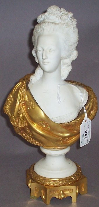 ***GILT BRASS AND PARIAN WARE SCULPTURE: Bust of 18th Century woman, approximate height 11 1/2''.