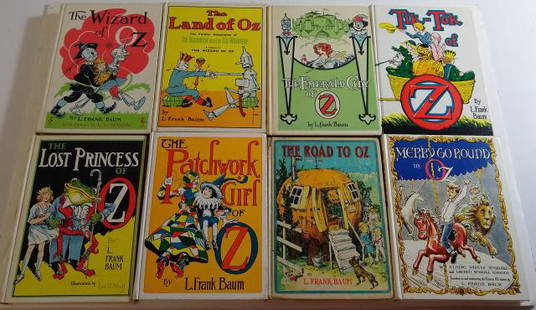 8 HARD COVER WIZARD OF OZ BOOKS: 7 by L. Frank Baum, "The Road to Oz", "The Patchwork Girl of Oz", "The Lost Princess of Oz", "Tik-Tok of Oz", "The Emerald City of Oz", "The Land of Oz", "The Wizard of Oz", and "Merry Go Round in Oz"