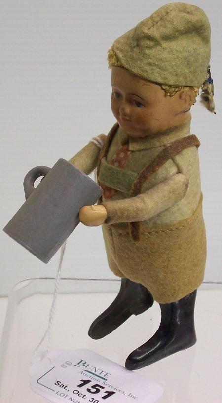 WIND-UP TOY: Depicting figure of drinking beer, marked ''Schuco, Made in Germany'', comes from the estate of Geraldine (Jerrie) Kneipper, Kenosha, WI, member of ''The Badger State Doll Club'', approximate height 5