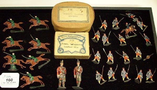 GROUP: Lead figures, including Ernst Heinrichsen Nurnberg No 1-8 Franz. Imfanterie Laufend 1870, Schweiz. Cavallerie Sprengend, comes from the estate of Geraldine (Jerrie) Kneipper, Kenosha, WI, member of ''