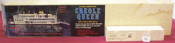 ***SCALE MODEL OF THE CREOLE QUEEN: ***SCALE MODEL OF THE CREOLE QUEEN| New Orleans paddlewheel riverboat, manufactured by Dumas Boats, kit #1222, including paddlewheel drive kit #2349. CONDITION: Good, kit box open but complete.