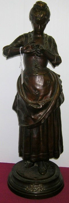 ***FRENCH BRONZE SCULPTURE: ''Fiancee'', depicting lady in full length dress putting on wedding ring, artist signed ''L. Haligon'', approximate height 24 1/2''.