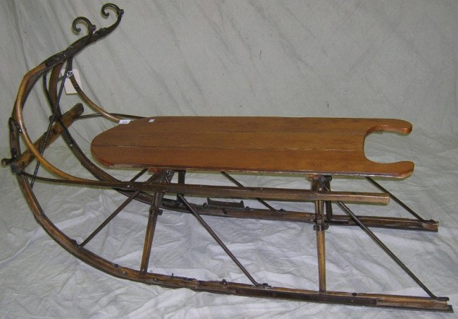 ***NINETEENTH CENTURY WOOD AND IRON SLED: Approximate height 31'', width 21, depth 50''.
