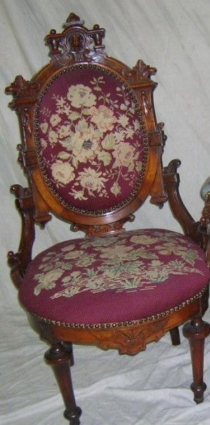 ***VICTORIAN SIDE CHAIR: ***VICTORIAN SIDE CHAIR| Renaissance revival style, having carved walnut frame decorated with classical masks and floral needlepoint upholstered back and seat. approximate height 42", width 22 1/2", d