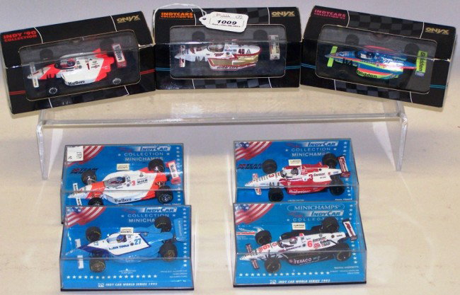 ***GROUP OF SIX 1/43 DIE CAST INDY CARS: By Minichamps and ONYX. Including Al Unser Sr., Geoff Bradham, Emerson Fittipaldi, Paul Tracy, Jacques Villeneuve and Mario Andretti.