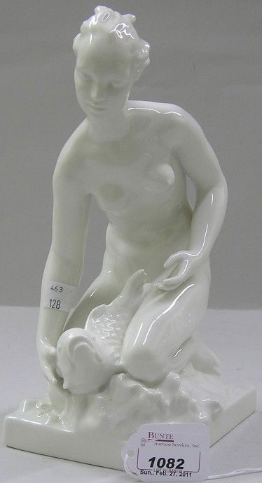 KPM WHITE PORCELAIN FIGURE: Depicting nude female with fish, having KPM blue scepter mark under glaze, approximate height 10 1/2''.